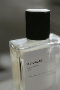 Close-up of Azimuth Collection Fine Fragrance Bottles